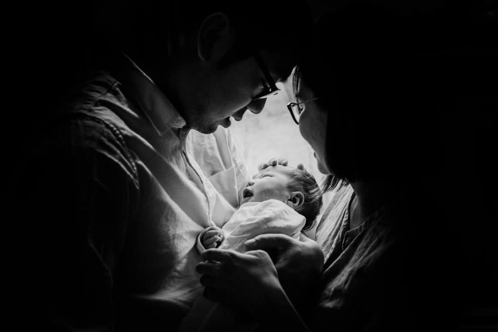 black and white portrait of new family lowell newborn photographer