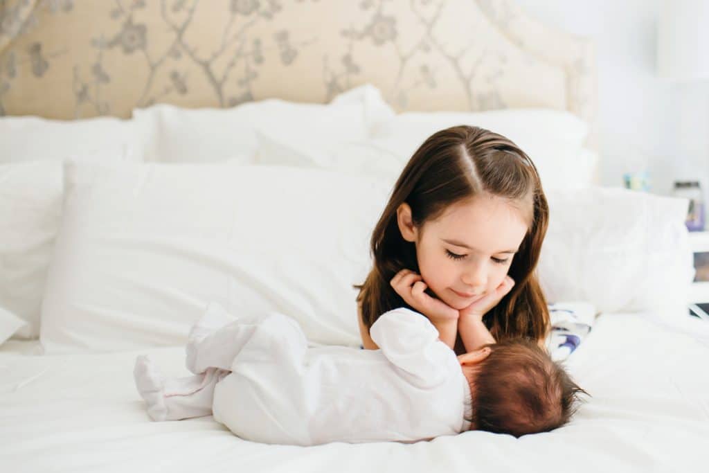 adoring big sister weston newborn photographer