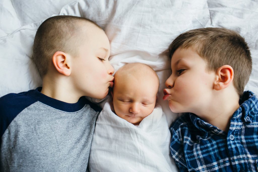big brothers with new baby brother rochester NY newborn photographer