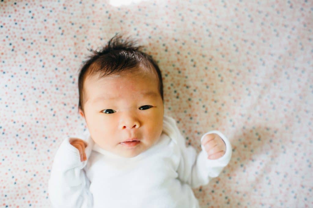 baby in nursery Acton newborn photographer