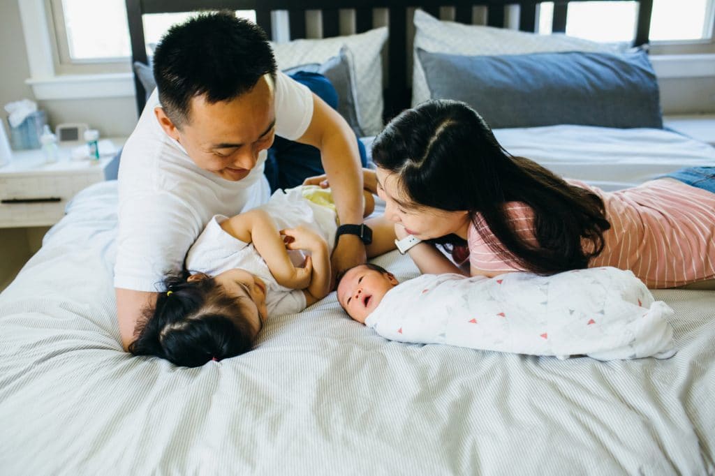 family adoring baby Acton newborn photographer