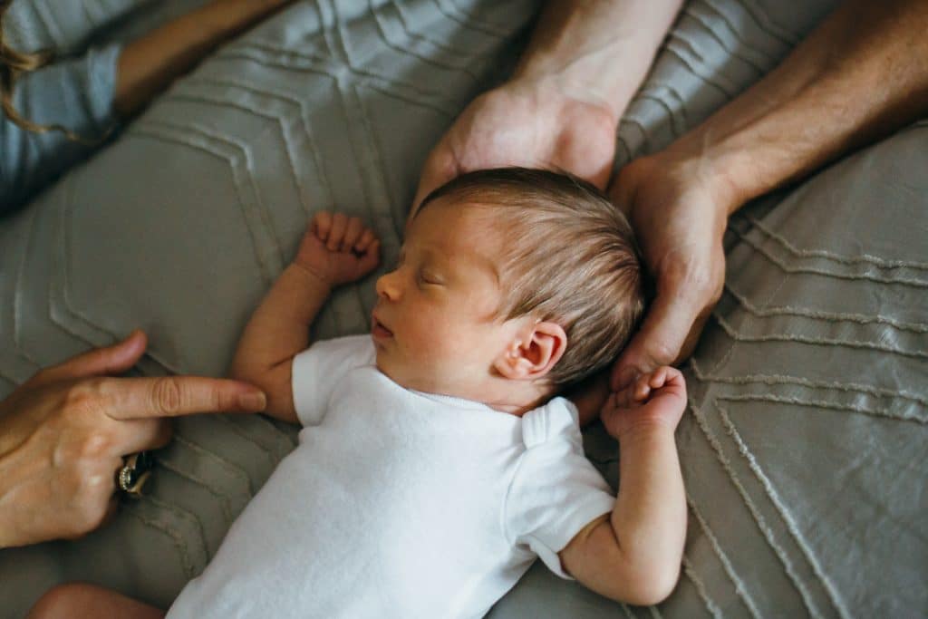baby in parents' hands Belmont newbornn photo