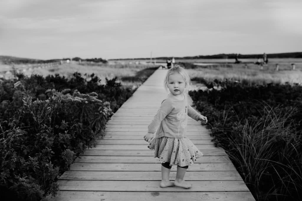 black and white girl on boardwalk Shore Family photographer