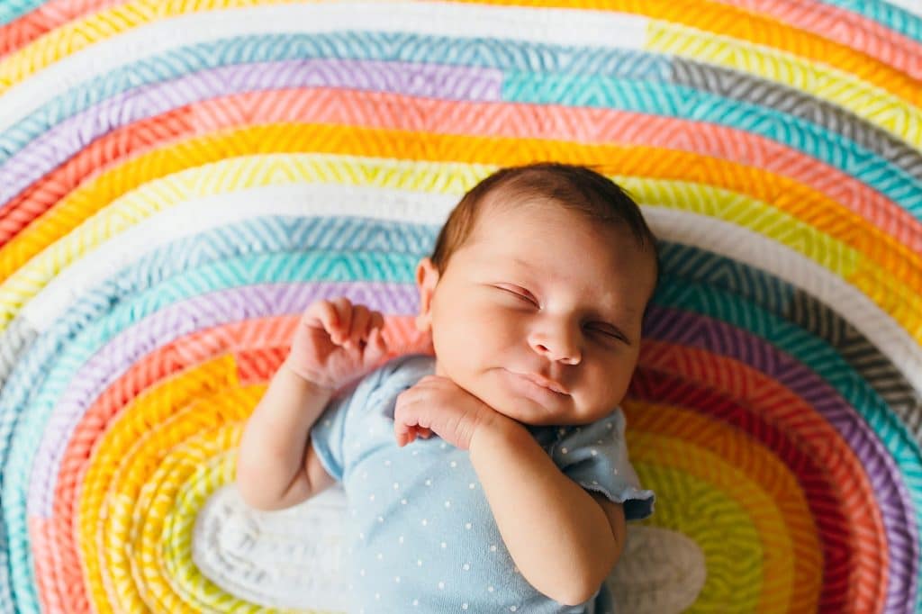 newborn sleeping on handmade blanket lexington baby photographer