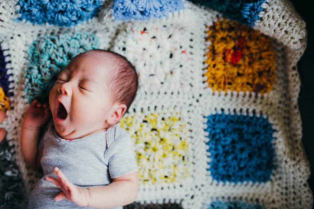 baby on crochet blanket brookline newborn photographer