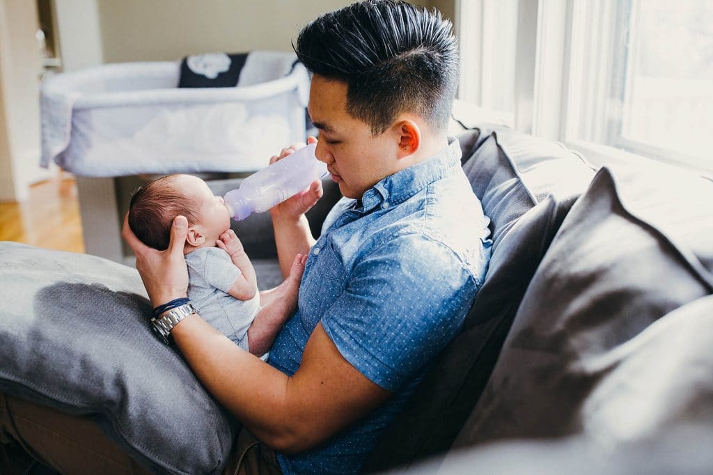 dad feeding baby brookline newborn photographer