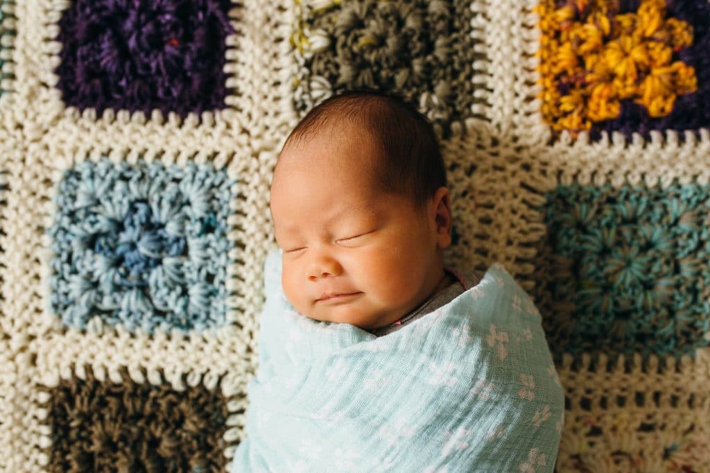 baby on crochet blanket brookline newborn photographer