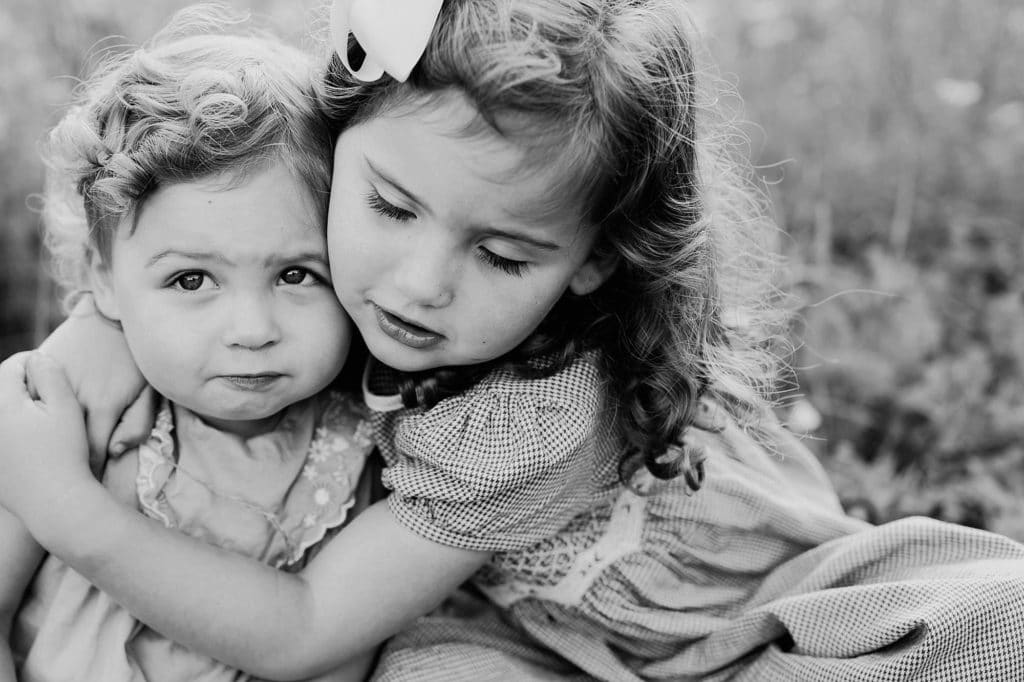 siblings hugging Needham Family Photographer