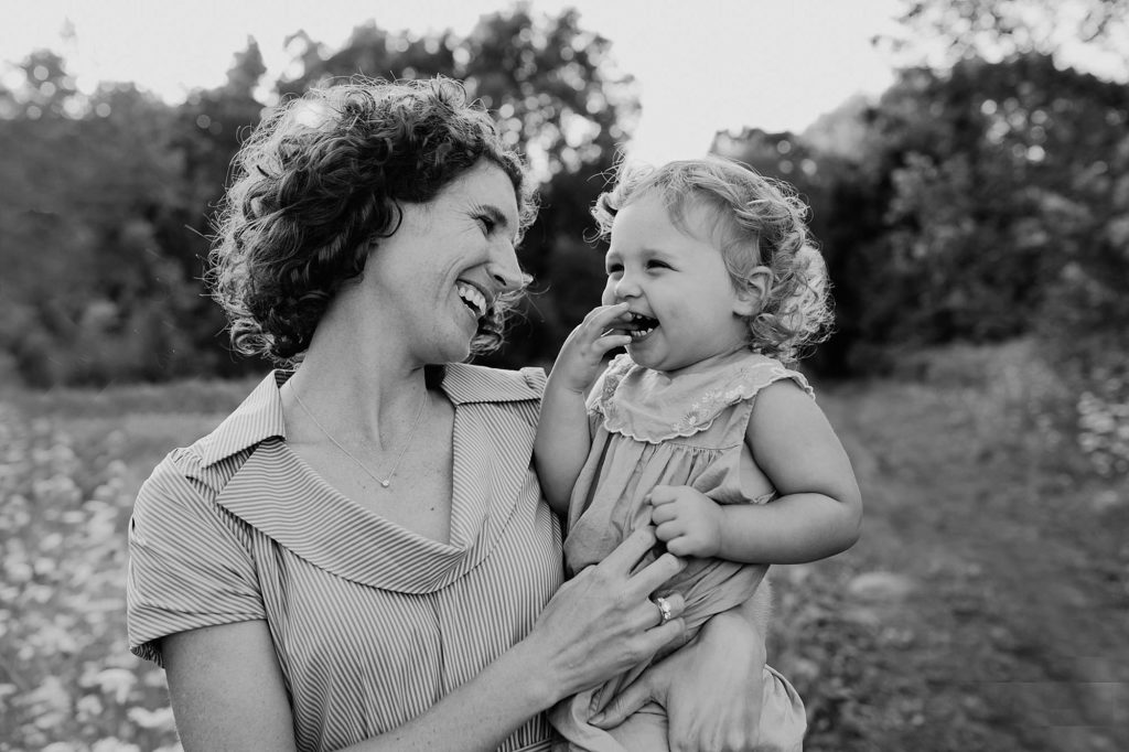 mom and daughter laughing Needham Family Photographer