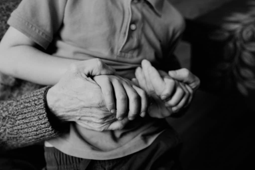 boy holding grandfather's hands Concord Photographer