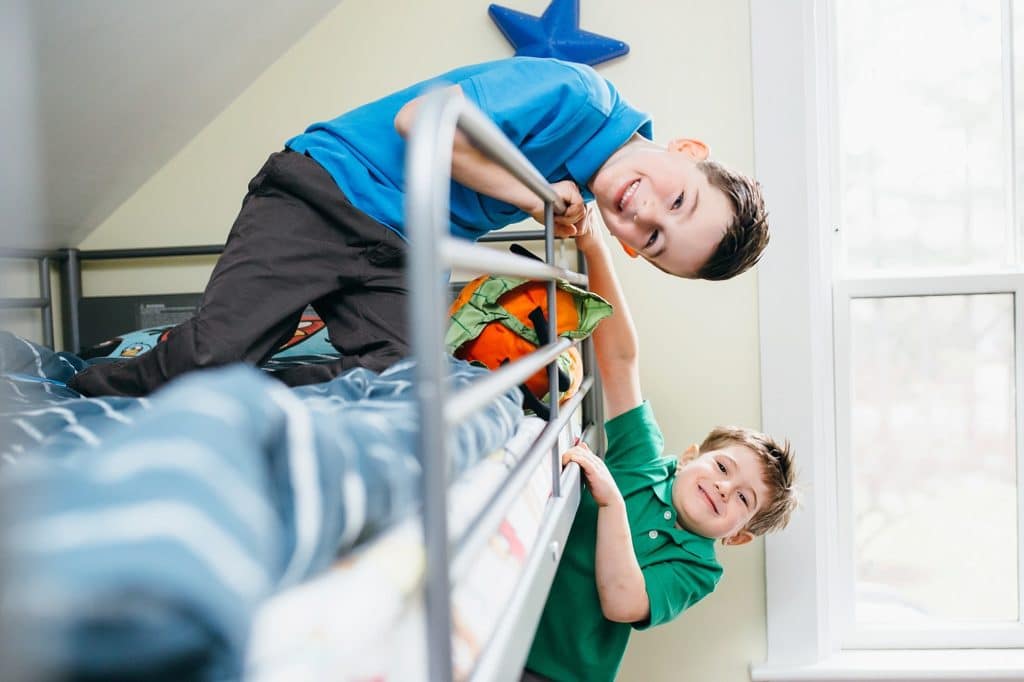 boys playing on bunk beds Concord Family Photographer 