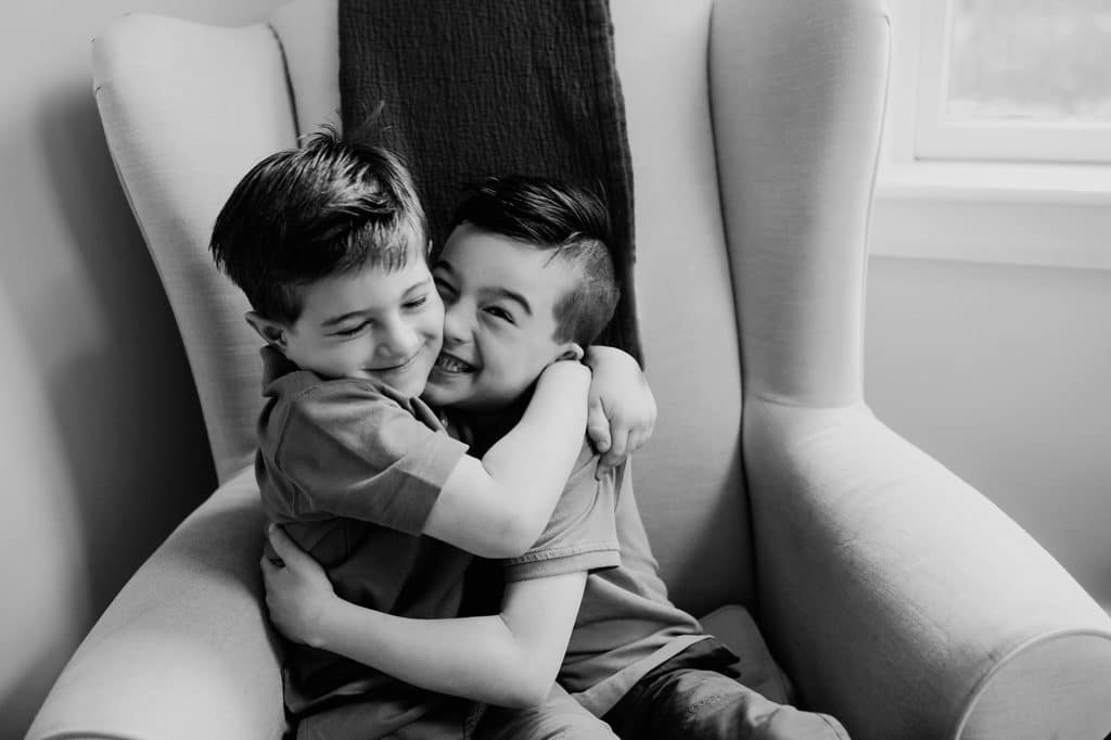 brothers hugging Concord Family Photographer 