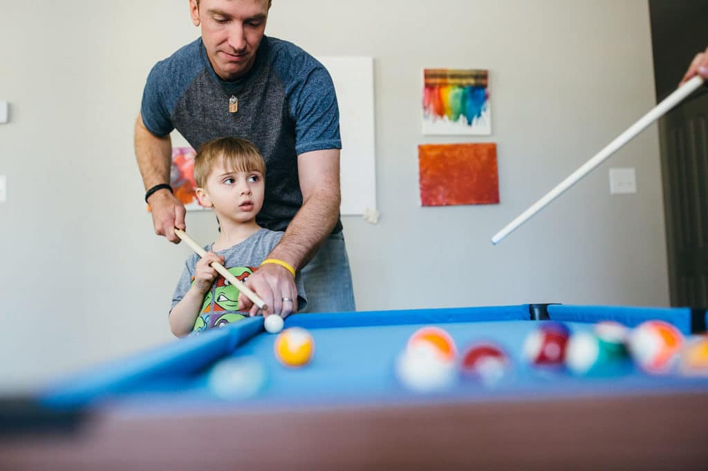 Playing pool with dad south shore family photographer