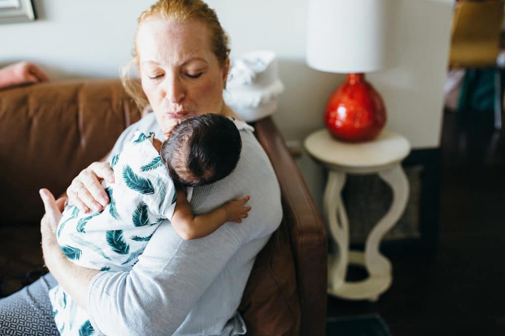 Grandmother burping baby Watertown newborn photographer