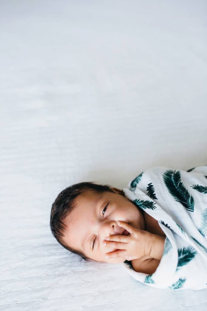 baby smiling newborn photographer