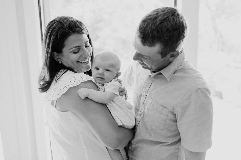 parents holding baby Arlington Baby Photographer 
