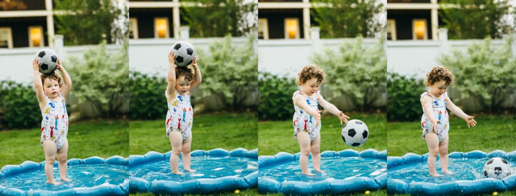 girl tossing a ball in the kiddie pool Boston family photographer 