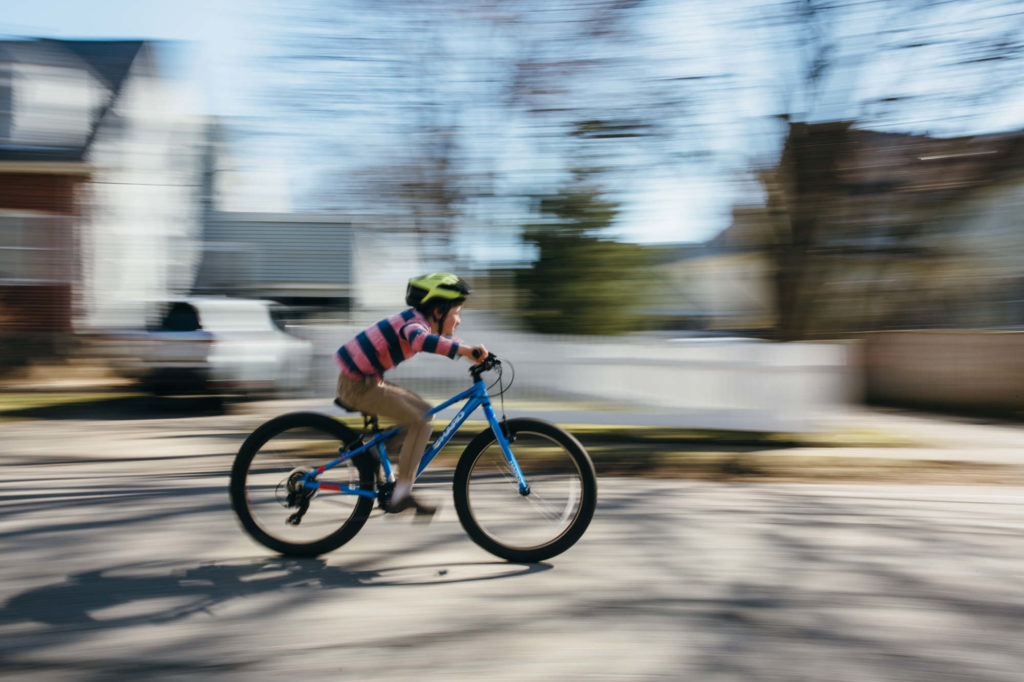 boy on bike going really fast 