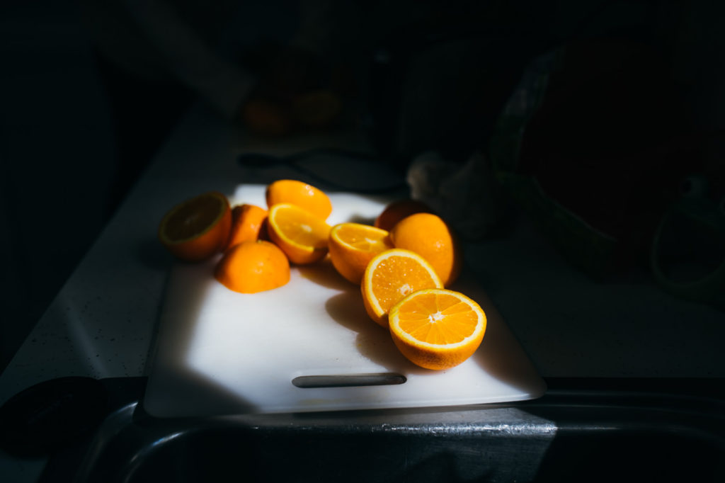 cut oranges in the sunlight
