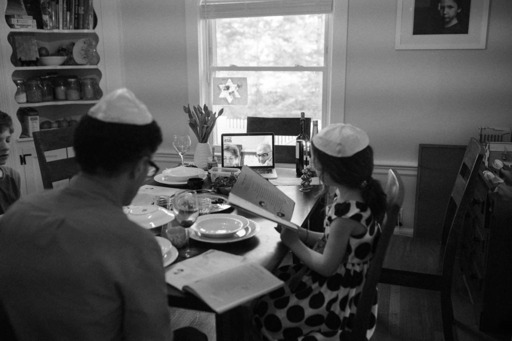 family having a zoom seder in belmont family photography
