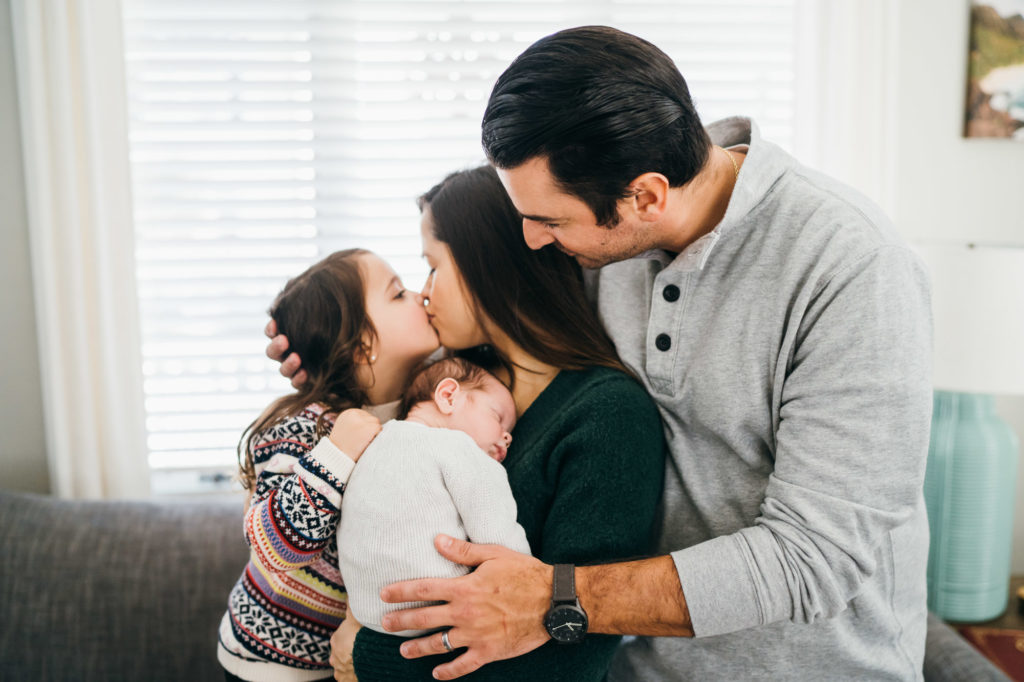 Family hugging Beautiful Boston newborn photos