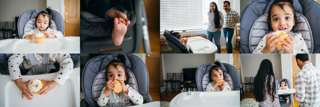 one year old eating a cupcake in a high chair in Boston home